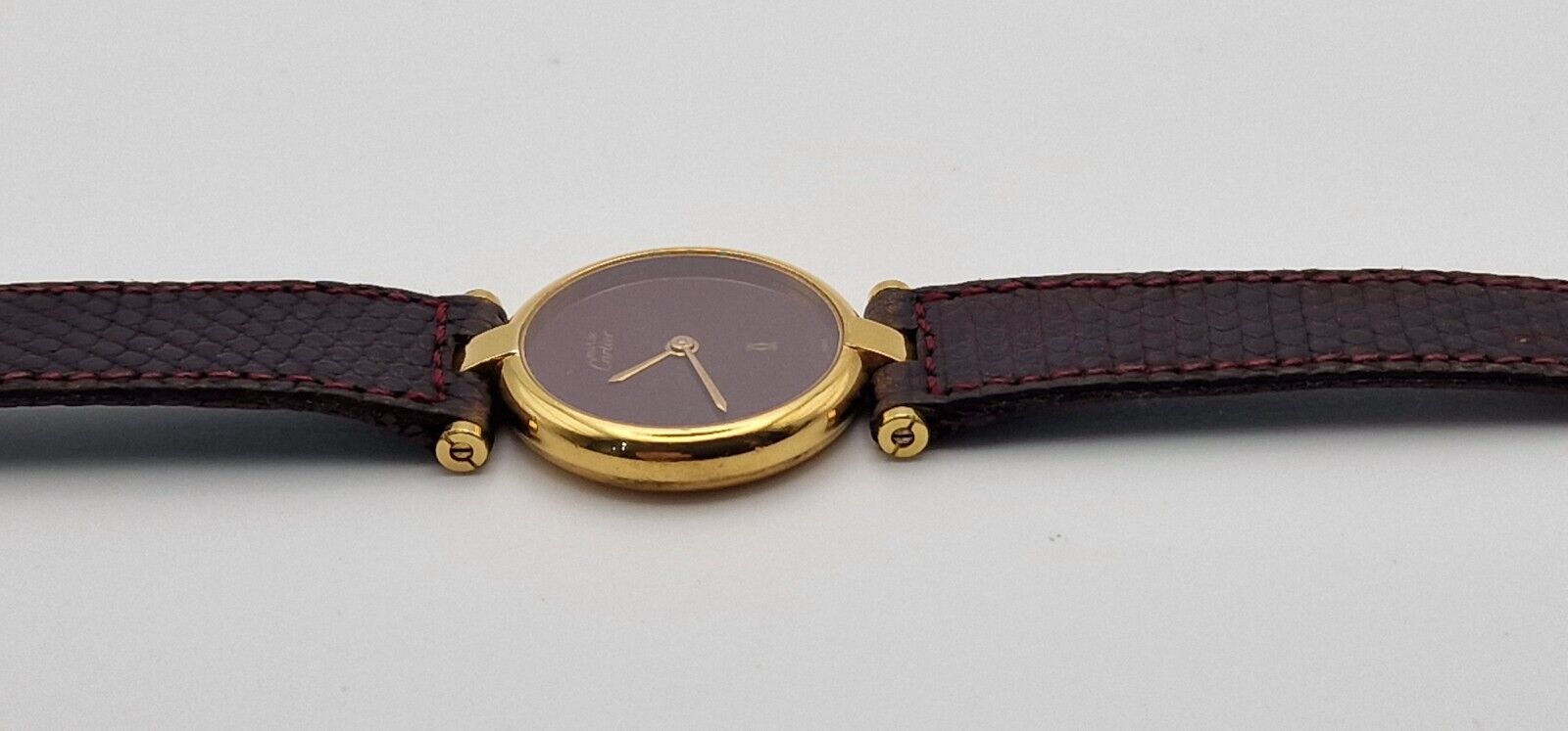 Must de Cartier 18ct Gold on Silver Lady's Watch. Burgundy Dial on Cartier Strap